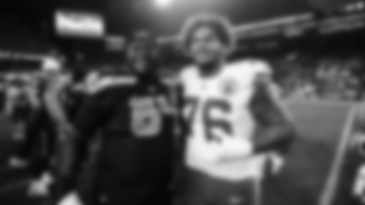 Kansas City Chiefs tackle Kingsley Suamataia (76) poses for a photo with Seattle Seahawks guard Christian Haynes (64) following a preseason week 2 NFL football game, Friday, August 15, 2025 in Seattle, WA.