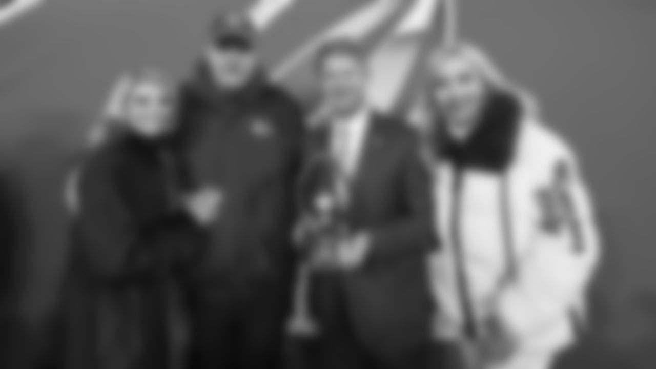 Tammy Reid, Kansas City Chiefs Head Coach Andy Reid, Chairman, CEO, and Owner Clark Hunt, and Tavia Hunt celebrate after the AFC Championship Game against the Baltimore Ravens on Sunday, January 28, 2024 in Baltimore.