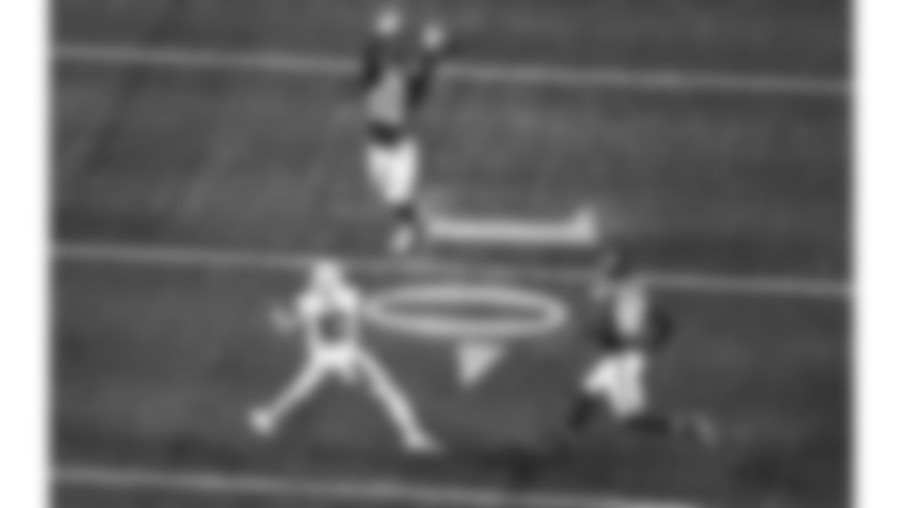 Kansas City Chiefs defensive end George Karlaftis (56) attempts to block a pass from Denver Broncos quarterback Bo Nix (10) during a week 17 NFL football game, Thursday, December 25, 2025 in Kansas City, MO.