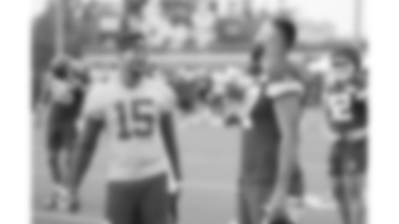 Kansas City Chiefs quarterback Patrick Mahomes (15) and tight end Travis Kelce (87) speak during day 11 of training camp practice on Sunday, August 3, 2025.