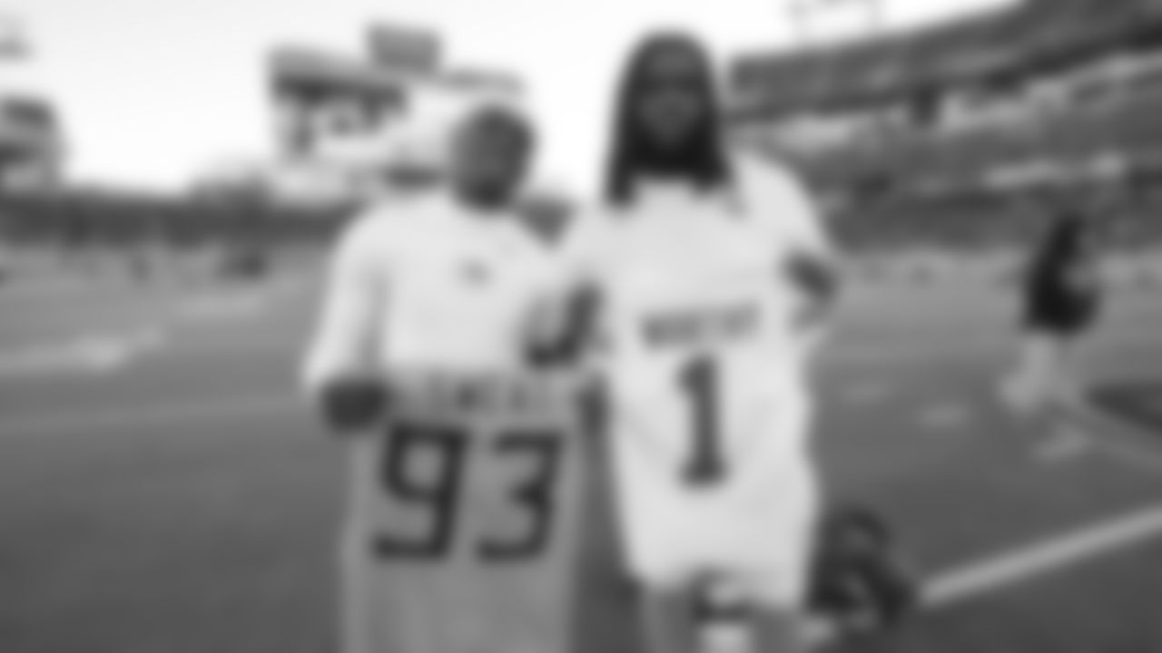 Kansas City Chiefs wide receiver Xavier Worthy (1) and Titans nose tackle T-Vondre Sweat (93) after a week 16 NFL Football game against the Tennessee Titans on Sunday, December 21, 2025 in Nashville, Tennessee.