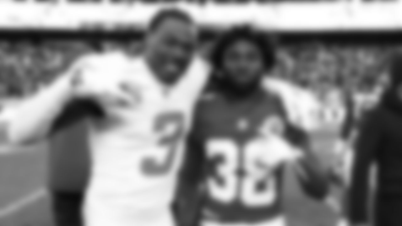 Kansas City Chiefs defensive back Kevin Knowles (38) poses for a photograph with San Diego Chargers safety Derwin James Jr. (3) after an NFL week 15 matchup against the Los Angeles Chargers, Sunday December 14, 2025.