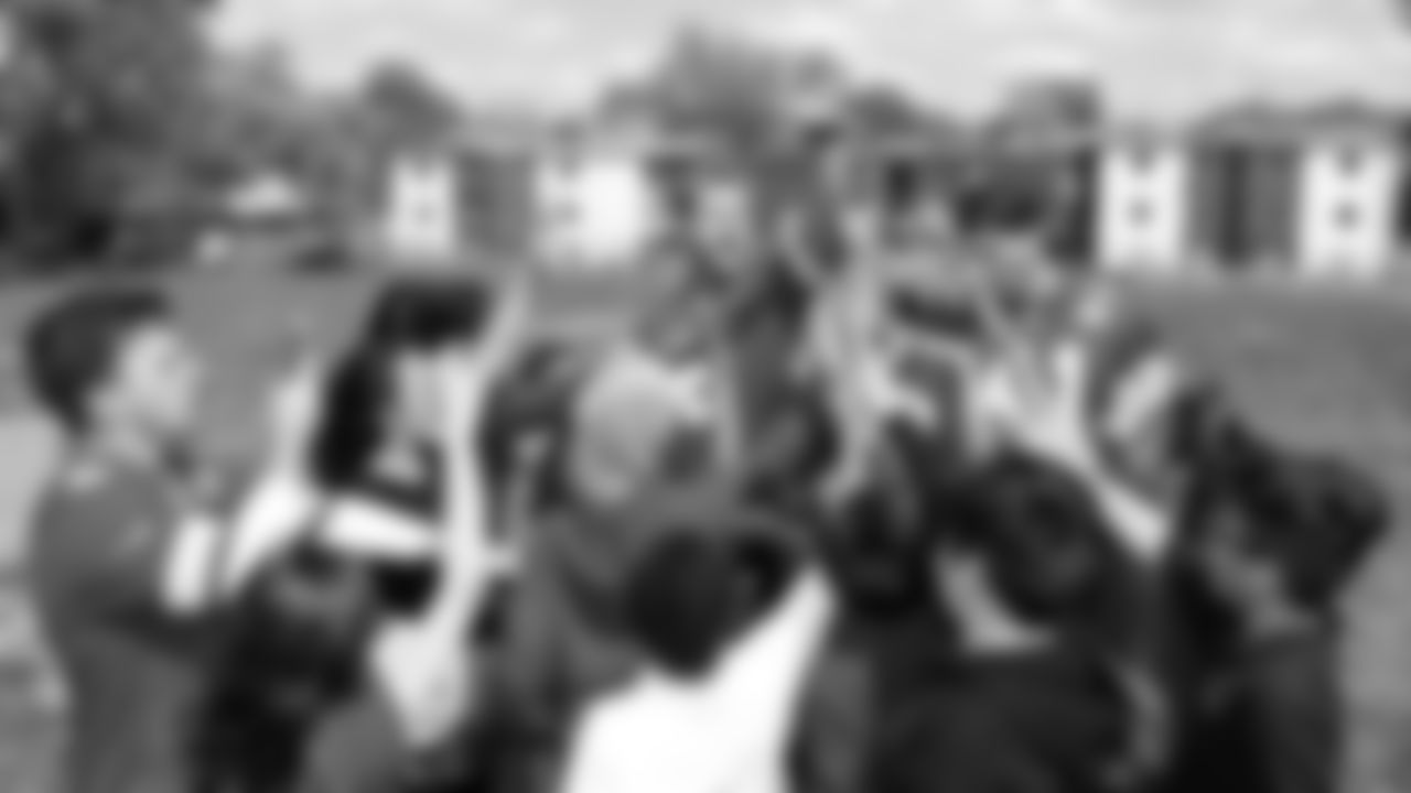 Kansas City Chiefs specialist visited the Kansas City Community Gardens to help students in their garden, Wednesday, April 19, 2017, in Kansas City, Missouri.