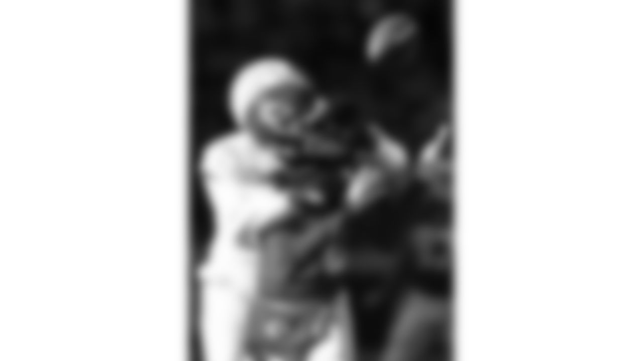 Los Angeles Chargers cornerback Cam Hart (20) breaks up a pass to Kansas City Chiefs wide receiver Tyquan Thornton (80) during a week 15 NFL football game, Sunday, December 14, 2025 in Kansas City, MO.