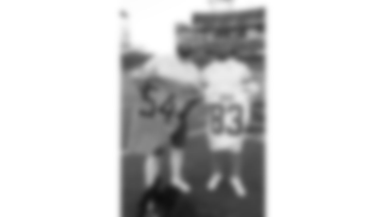 Kansas City Chiefs tight end Noah Gray (83) and Titans linebacker Dorian Mausi (54) after a week 16 NFL Football game against the Tennessee Titans on Sunday, December 21, 2025 in Nashville, Tennessee.