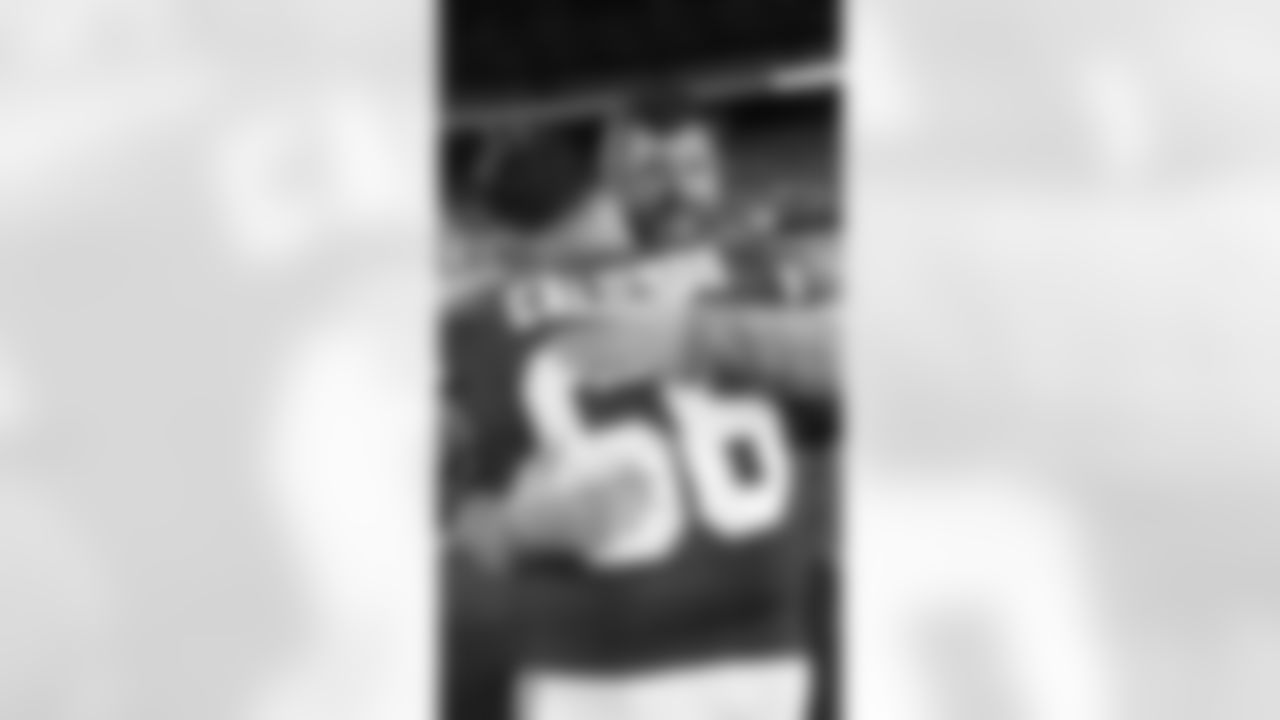 Kansas City Chiefs offensive lineman Michael Caliendo (66) and Chicago Bears offensive lineman Joe Thuney (62) hug after a preseason week 3 NFL football game against the Chicago Bears, Friday, August 22, 2025 in Kansas City, MO.