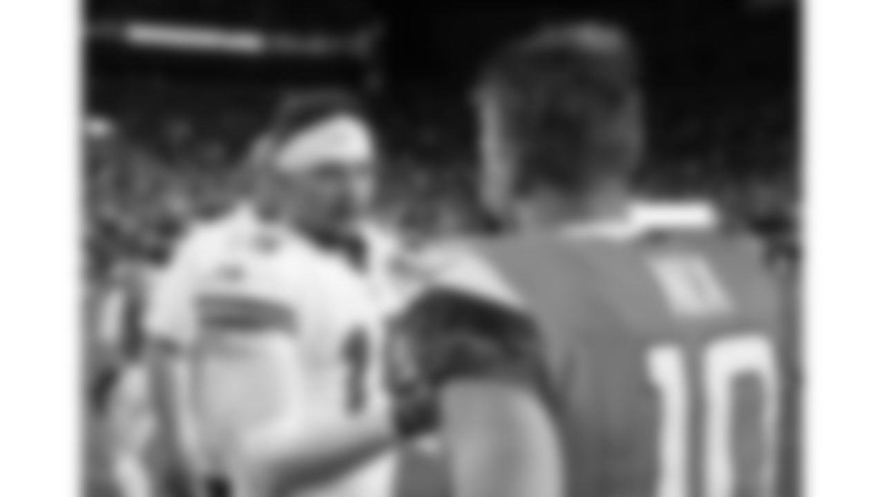 Kansas City Chiefs quarterback Patrick Mahomes (15) and Broncos quarterback Bo Nix (10) after a week 11 NFL Football game against the Denver Broncos on Sunday, November 16, 2025 in Denver, Colorado.