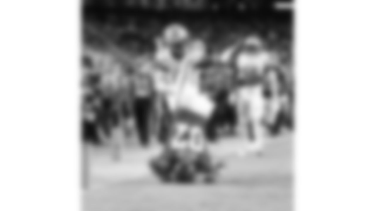 Kansas City Chiefs tight end Travis Kelce (87) gets tackled by Detroit Lions cornerback Rock Ya-Sin (23) while running the ball during the week 6 NFL football game, Sunday, October 12, 2025 in Kansas City, MO.