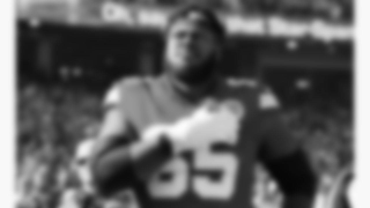 Kansas City Chiefs guard Trey Smith (65) looks on during the National Anthem prior to a week 12 NFL football game against the Indianapolis Colts, Sunday, November 23, 2025 in Kansas City, MO.