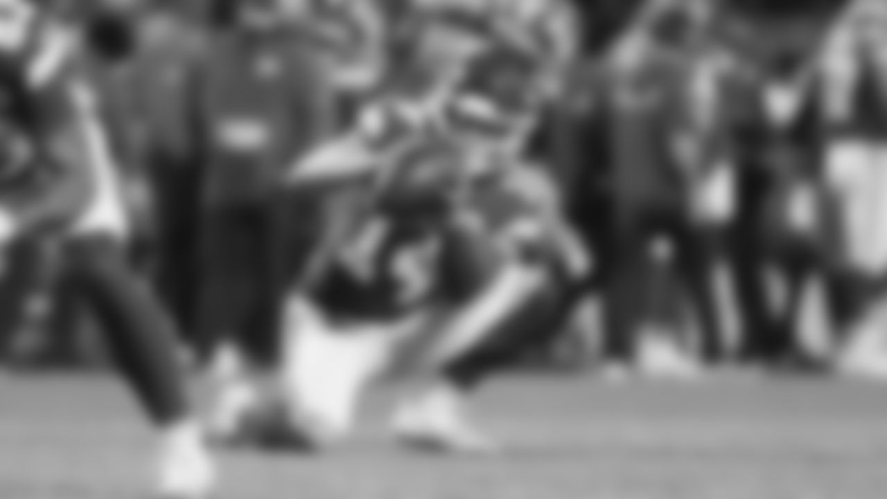 Kansas City Chiefs punter Matt Araiza (14) holds the ball for and extra point during an NFL week 17 matchup against the Denver Broncos, Thursday, December 25, 2025.