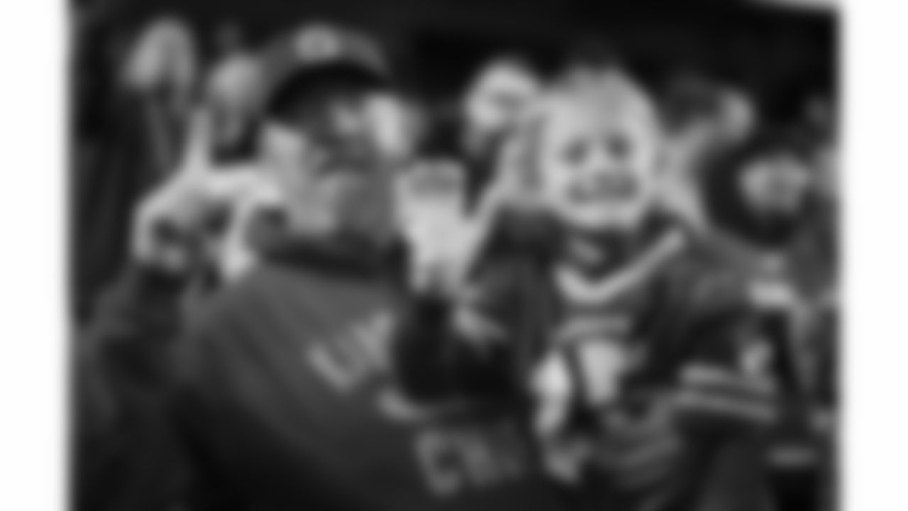 Kansas City Chiefs fans smile during a week 17 NFL football game against the Denver Broncos, Thursday, December 25, 2025 in Kansas City, MO.