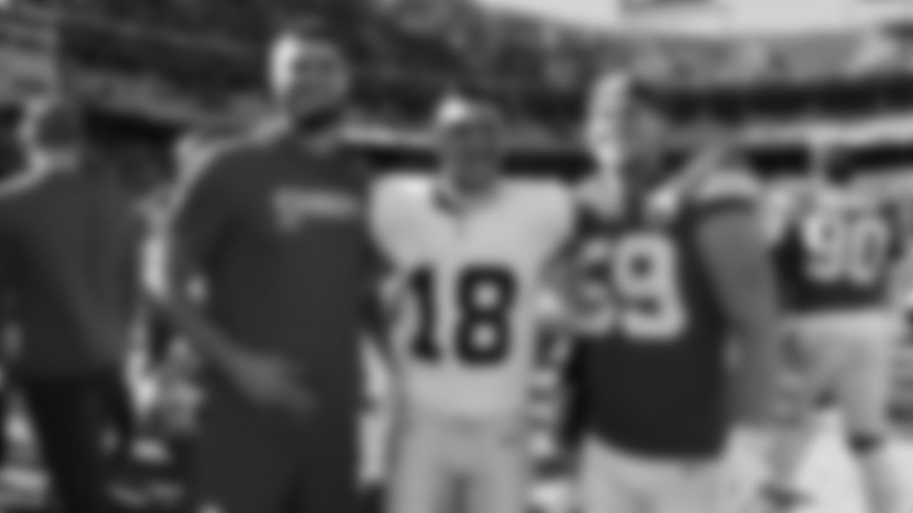 Tight end Jared Wiley (12) and Kansas City Chiefs linebacker Cooper McDonald (59) pose with Las Vegas Raiders wide receiver Jack Bech (18) after a week 7 NFL Football game against the Las Vegas Raiders on Sunday, October 19, 2025 in Kansas City, MO.