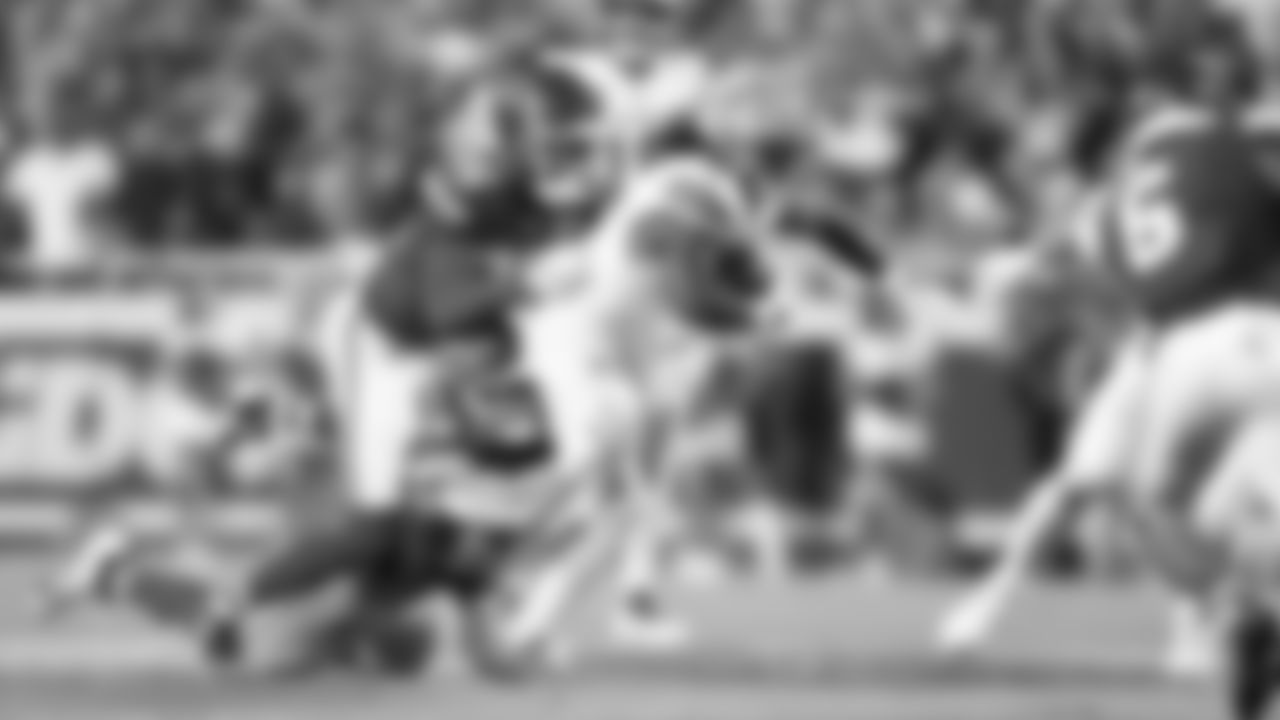 Kansas City Chiefs linebacker Leo Chenal (54) and cornerback Jaylen Watson (35) tackle Detroit Lions running back Jahmyr Gibbs (0) during the week 6 NFL football game, Sunday, October 12, 2025 in Kansas City, MO.