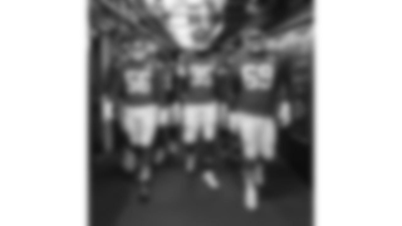 Kansas City Chiefs defensive end George Karlaftis (56), defensive tackle Chris Jones (95) and defensive tackle Mike Pennel (69) walk down the 50-yard tunnel prior to a week 12 NFL football game against the Indianapolis Colts, Sunday, November 23, 2025 in Kansas City, MO.