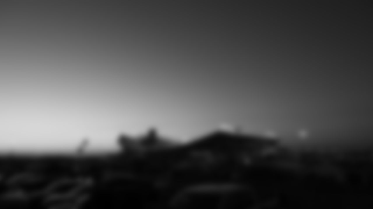 An exterior scenic view of the sun setting behind GEHA Field at Arrowhead Stadium prior to a week 14 NFL football game between the Kansas City Chiefs and the Houston Texans, Sunday, December 7, 2025 in Kansas City, MO.