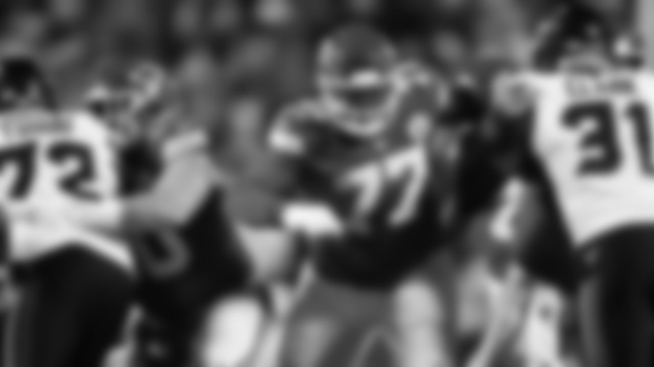Kansas City Chiefs offensive lineman Jaylon Moore (77) blocks during a week 14 NFL football game against the Houston Texans, Sunday, December 7, 2025 in Kansas City, MO.