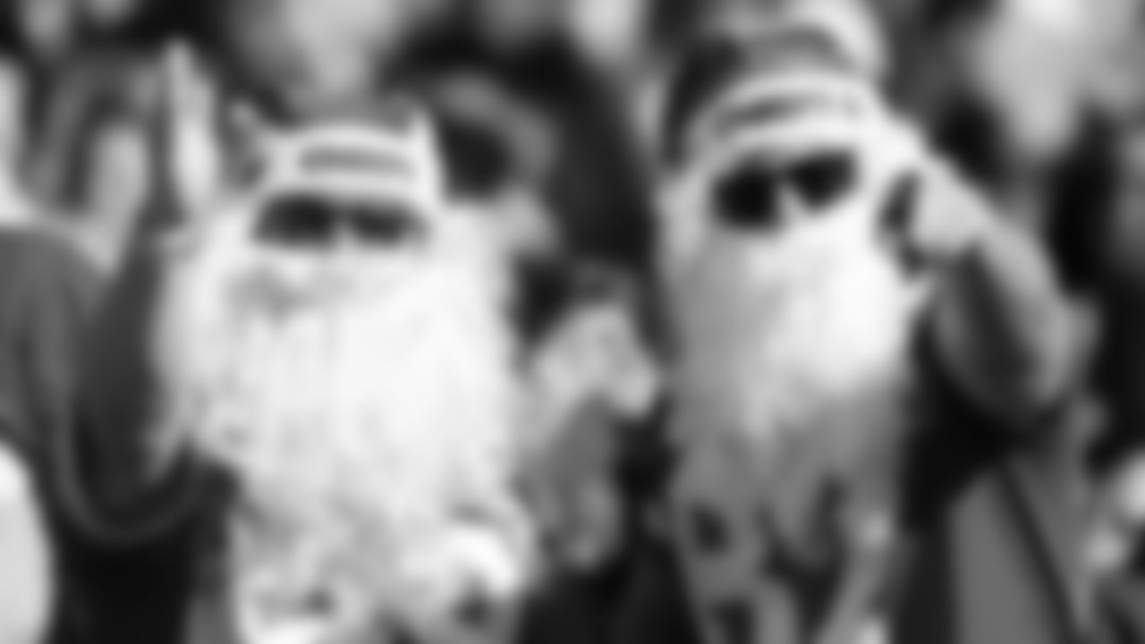 Kansas City Chiefs fans dressed as Santa during a week 16 NFL Football game against the Tennessee Titans on Sunday, December 21, 2025 in Nashville, Tennessee.