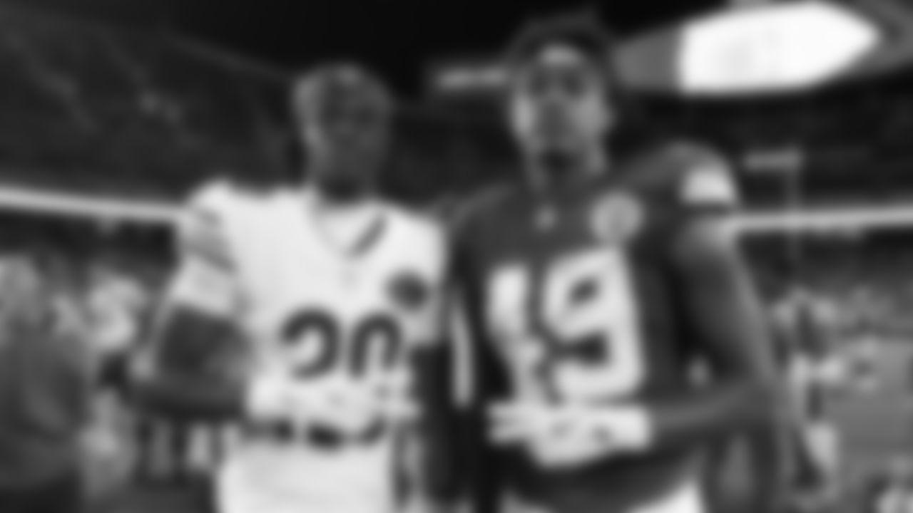 Kansas City Chiefs tight end Geor'Quarius Spivey (49) and Chicago Bears wide receiver Jahdae Walker (20) pose for a picture after a preseason week 3 NFL football game against the Chicago Bears, Friday, August 22, 2025 in Kansas City, MO.