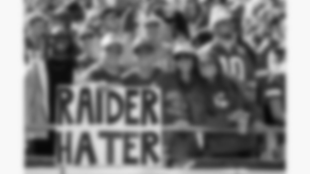 Kansas City Chiefs fans hold a sign during a week 7 NFL football game against the Las Vegas Raiders, Sunday, October 19, 2025 in Kansas City, MO.