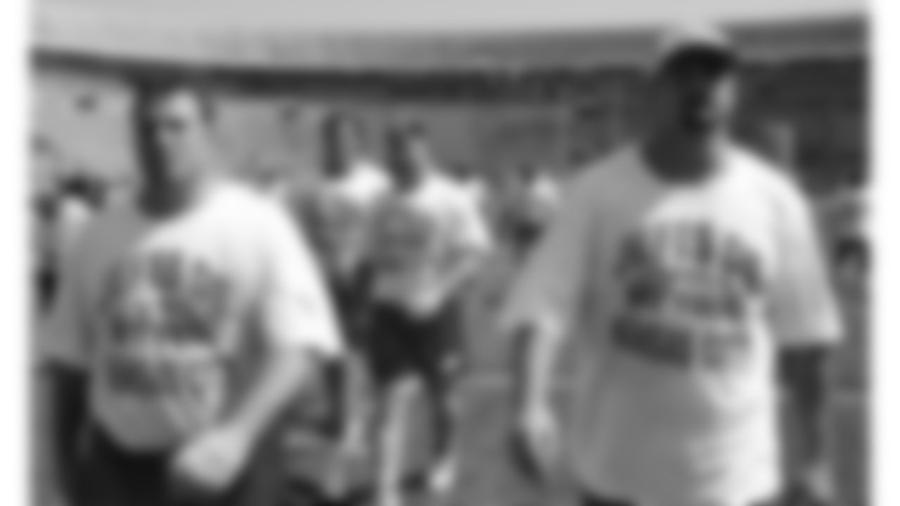 Kansas City Chiefs players walk off the field after practice during the 1996 preseason trip to Monterrey, Mexico.