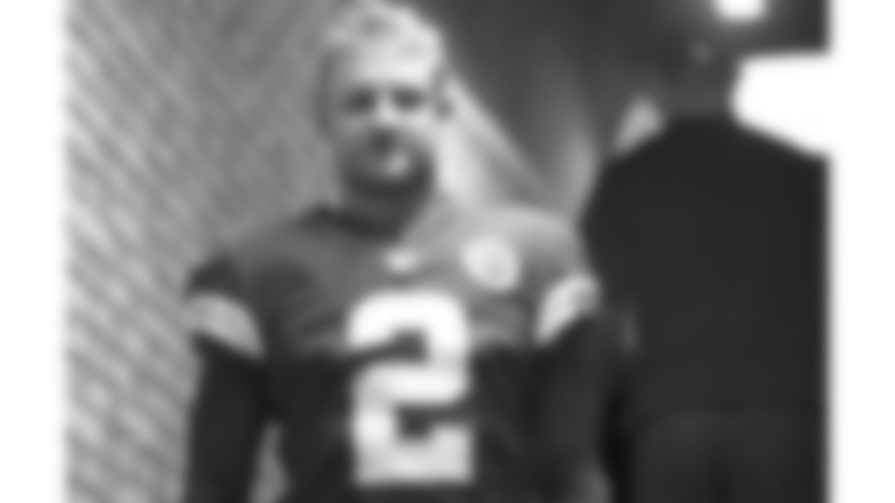 Kansas City Chiefs punter Dustin Colquitt (2) walks down a tunnel prior to a 2017 away game.