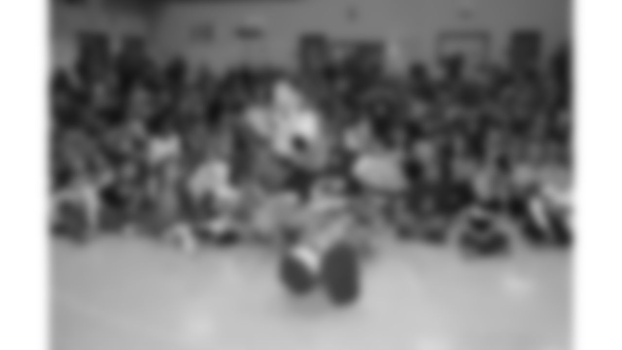 Dustin Colquitt, the Chiefs Community Caring Team and KC Wolf visited Sunset Valley Elementary School on December 5, 2017.