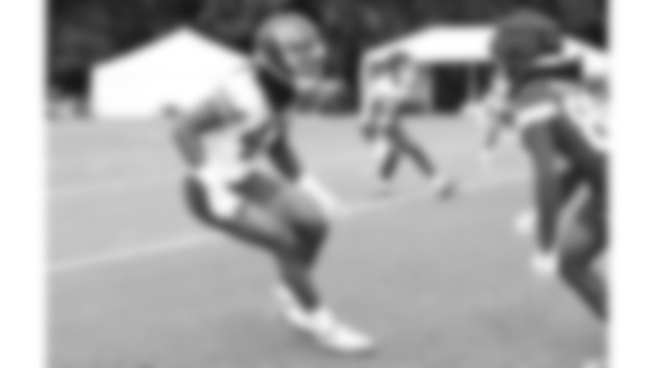 Kansas City Chiefs cornerback Azizi Hearn (47) defends wide receiver Elijhah Badger (80) during day 11 of training camp practice on Sunday, August 3, 2025.