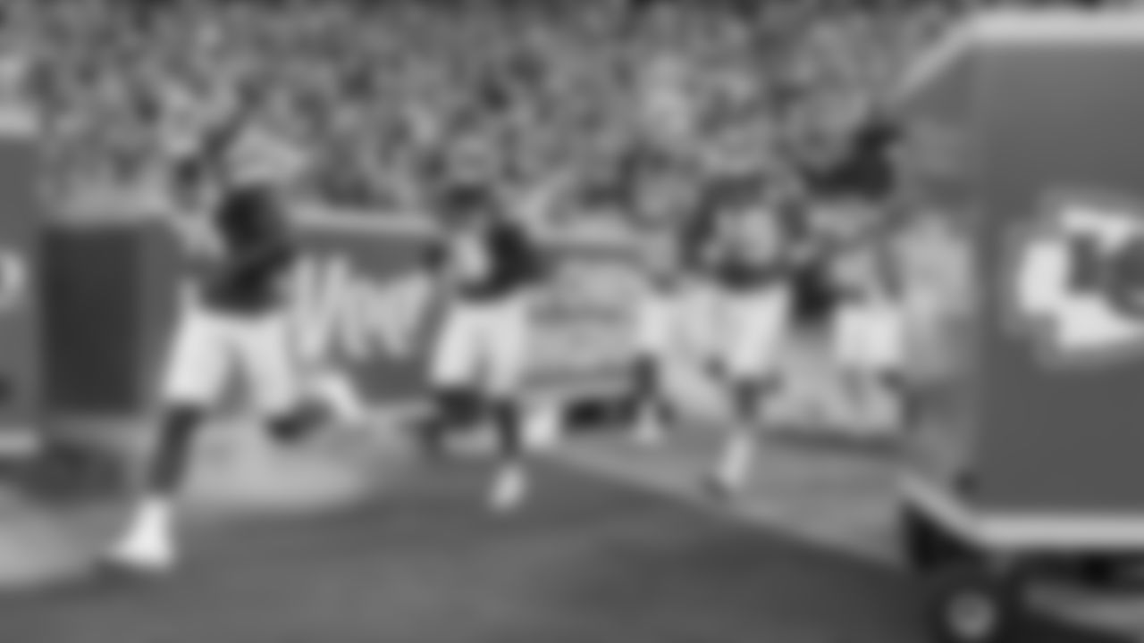 Kansas City Chiefs wide receiver Nikko Remigio (81), Kansas City Chiefs wide receiver Hal Presley (13), and Kansas City Chiefs quarterback Chris Oladokun (19) run out the tunnel prior to a preseason week 3 NFL football game against the Chicago Bears, Friday, August 22, 2025 in Kansas City, MO.