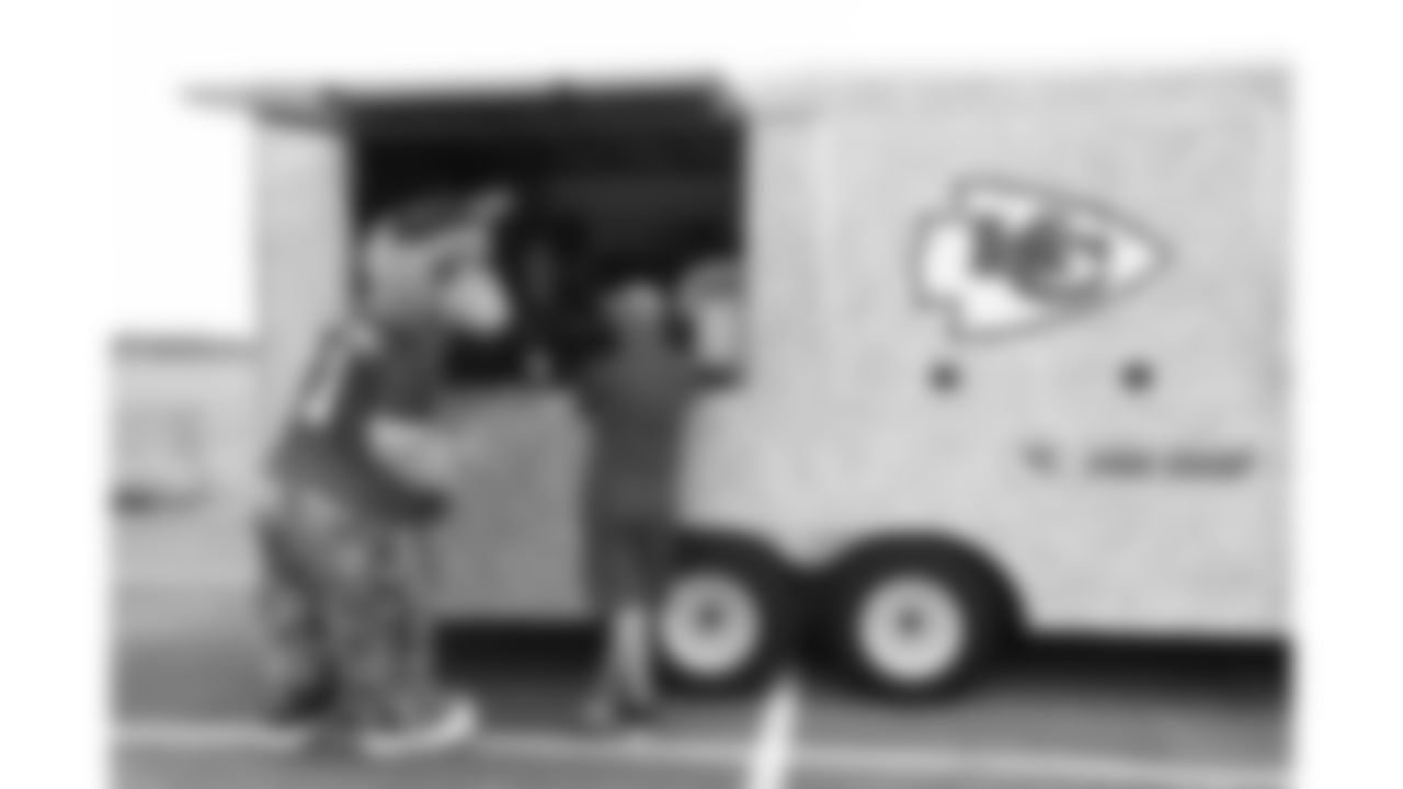 KC Wolf interacts with the Official Pro Shop during day 1 of the Season Ticket Member First Look Event on Tuesday June 17, 2025 in Kansas City, MO.