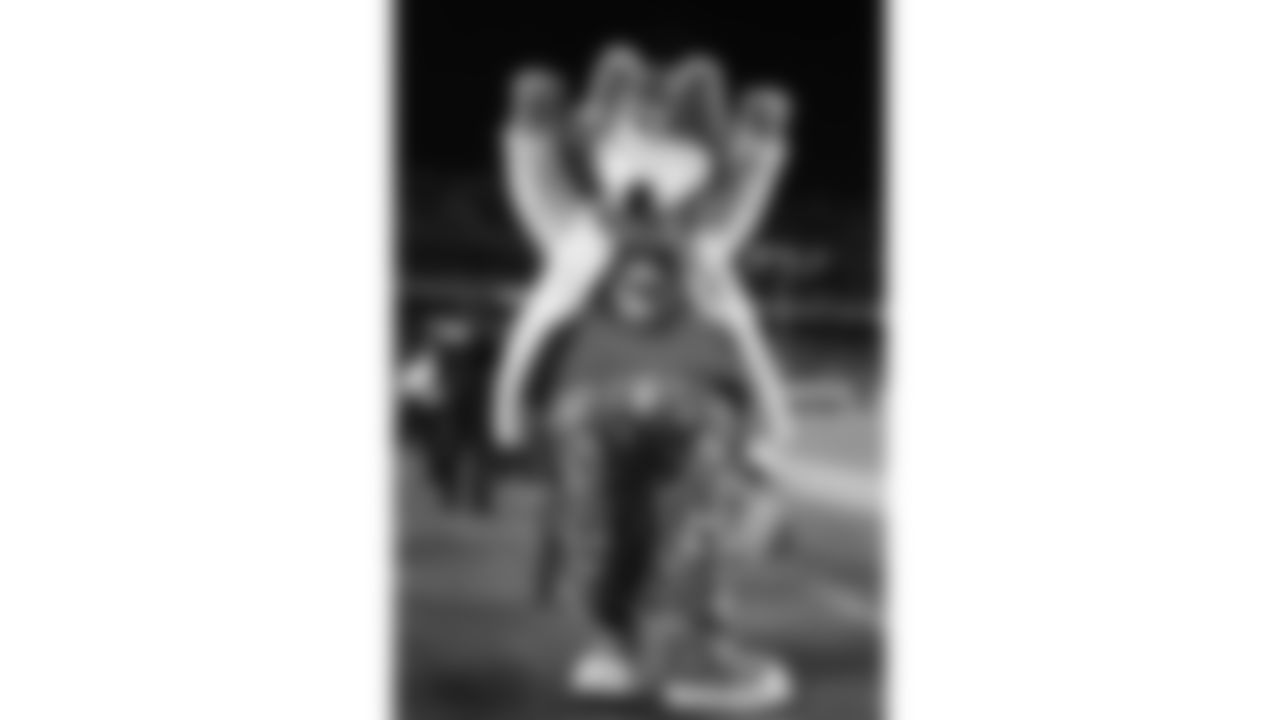 KC Wolf wears a white Build-A-Bear coat during a week 14 NFL Football game against the Houston Texans on Sunday, December 7, 2025 in Kansas City, MO.