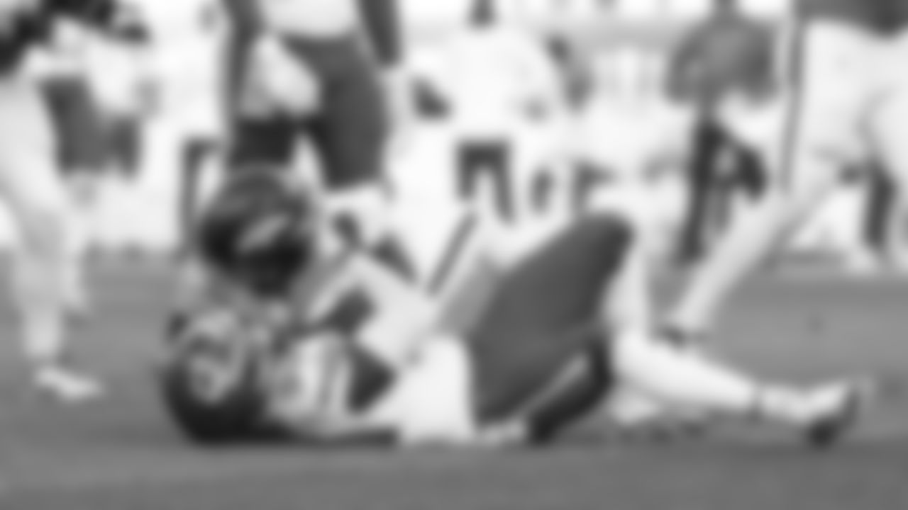 Kansas City Chiefs defensive end Charles Omenihu (90) makes a tackle during a week 11 NFL Football game against the Denver Broncos on Sunday, November 16, 2025 in Denver, Colorado.