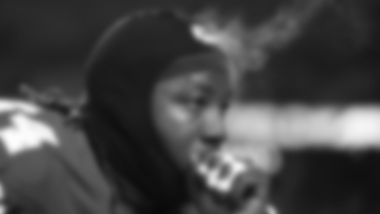 Kansas City Chiefs offensive tackle Wanya Morris (64) prays prior to an NFL week 14 matchup against the Houston Texans, Sunday December 7, 2025.