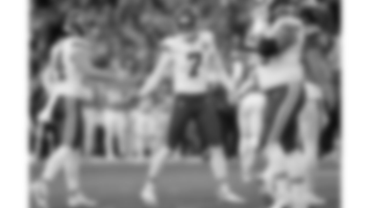Kansas City Chiefs kicker Harrison Butker (7) high fives punter Matt Araiza (14) after a field goal during a week 11 NFL Football game against the Denver Broncos on Sunday, November 16, 2025 in Denver, Colorado.