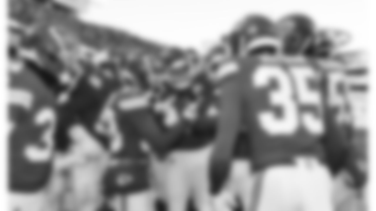 The Kansas City Chiefs defense celebrates in the end zone after an interception during a week 15 NFL football game against the Los Angeles Chargers, Sunday, December 14, 2025 in Kansas City, MO.