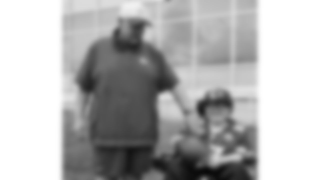 Josh "Turbo" Pham, a child battling an aggressive disease, visits practice during phase 3 of OTAs on Friday, June 13, 2025 in Kansas City, MO.
