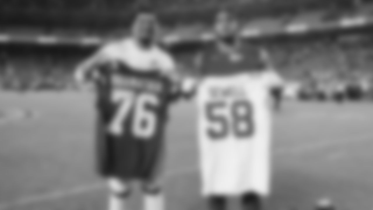 Kansas City Chiefs tackle Kingsley Suamataia (76) exchanges jerseys with Detroit Lions offensive tackle Penei Sewell (58) after a week 6 NFL Football game against the Detroit Lions on Sunday, October 12, 2025 in Kansas City, MO.