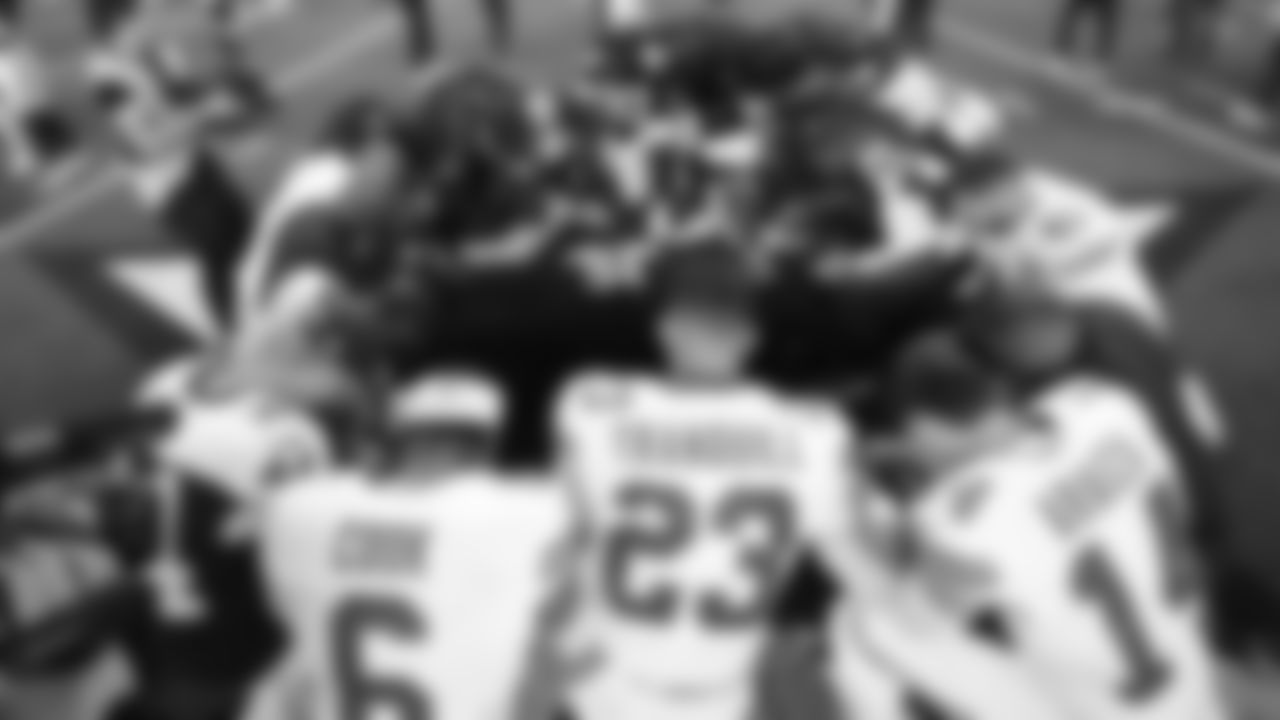 Kansas City Chiefs safety Bryan Cook (6), middle linebacker Drue Tranquill (23), and punter Matt Araiza (14) pray after a week 13 NFL football game against the Dallas Cowboys on Thursday, November 27, 2025 in Arlington, TX.