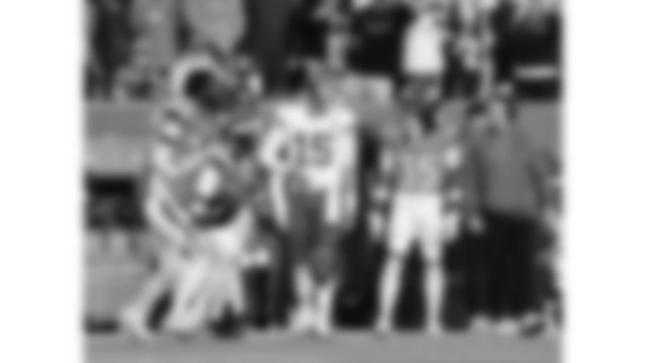 Kansas City Chiefs quarterback Patrick Mahomes (15) runs into the Broncos sideline during a week 11 NFL Football game against the Denver Broncos on Sunday, November 16, 2025 in Denver, Colorado.
