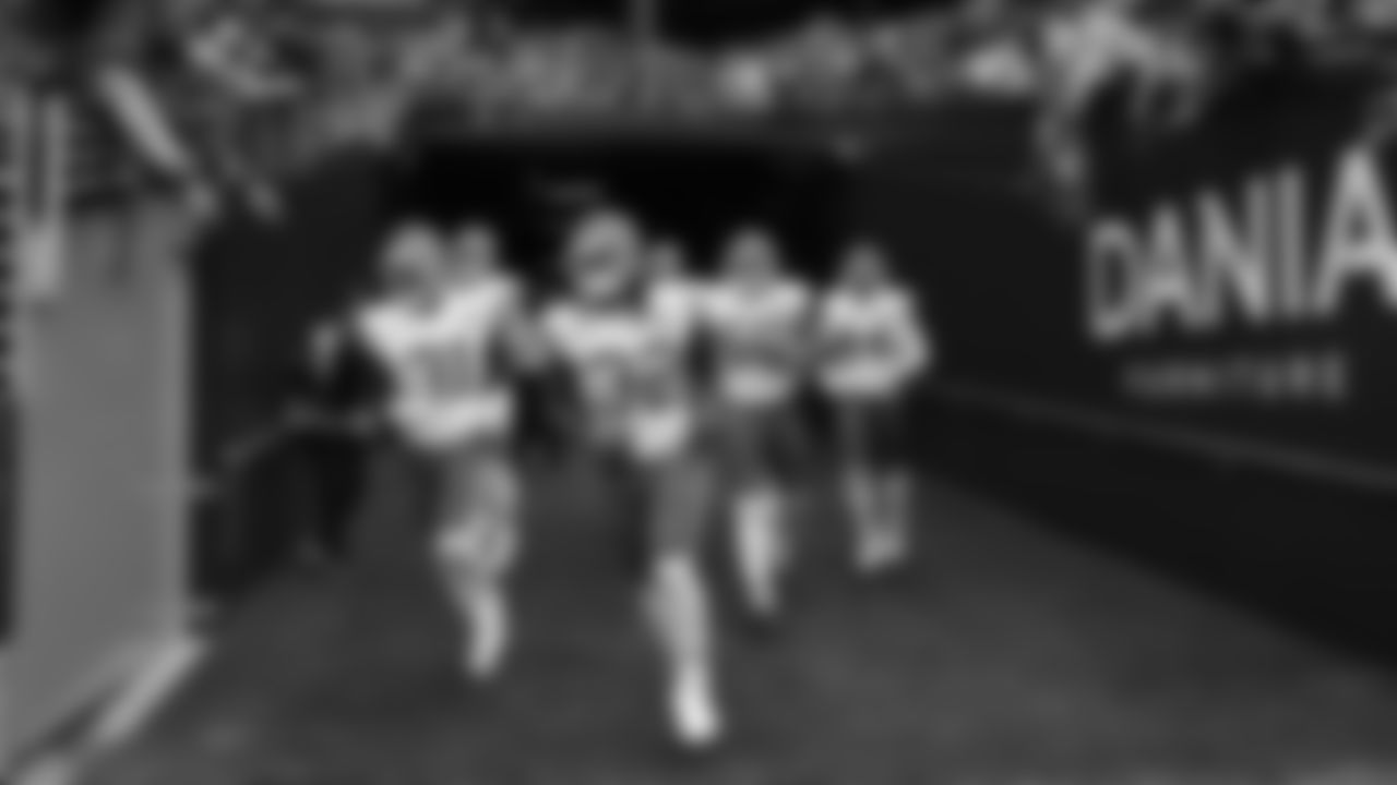 Kansas City Chiefs linebackers Jeffrey Bassa (31), Nick Bolton (32), Brandon George (50), and Cam Jones (44) run onto the field prior to a preseason week 2 NFL football game against the Seattle Seahawks, Friday, August 15, 2025 in Seattle, WA.