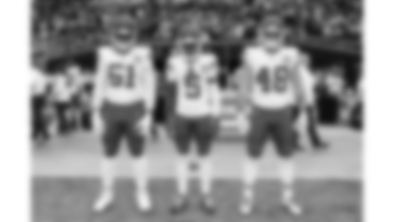 Team Captains Kansas City Chiefs defensive end Mike Danna (51), wide receiver Hollywood Brown (5) and linebacker Cole Christiansen (48) prior to a week 18 game against the Las Vegas Raiders on Sunday, January 3, 2026.