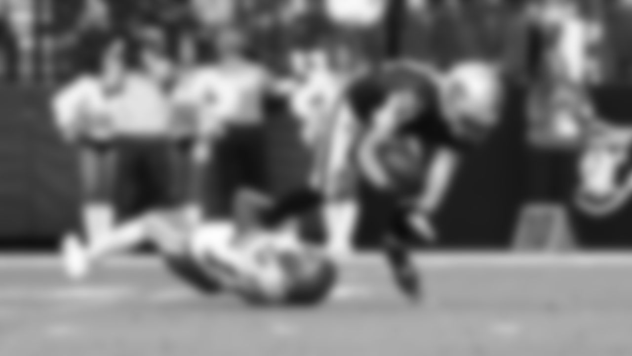 Kansas City Chiefs safety Nazeeh Johnson (13) tackles Las Vegas Raiders wide receiver Alex Bachman (81) during a week 18 NFL football game, Sunday, January 4, 2026 in Las Vegas, NV.