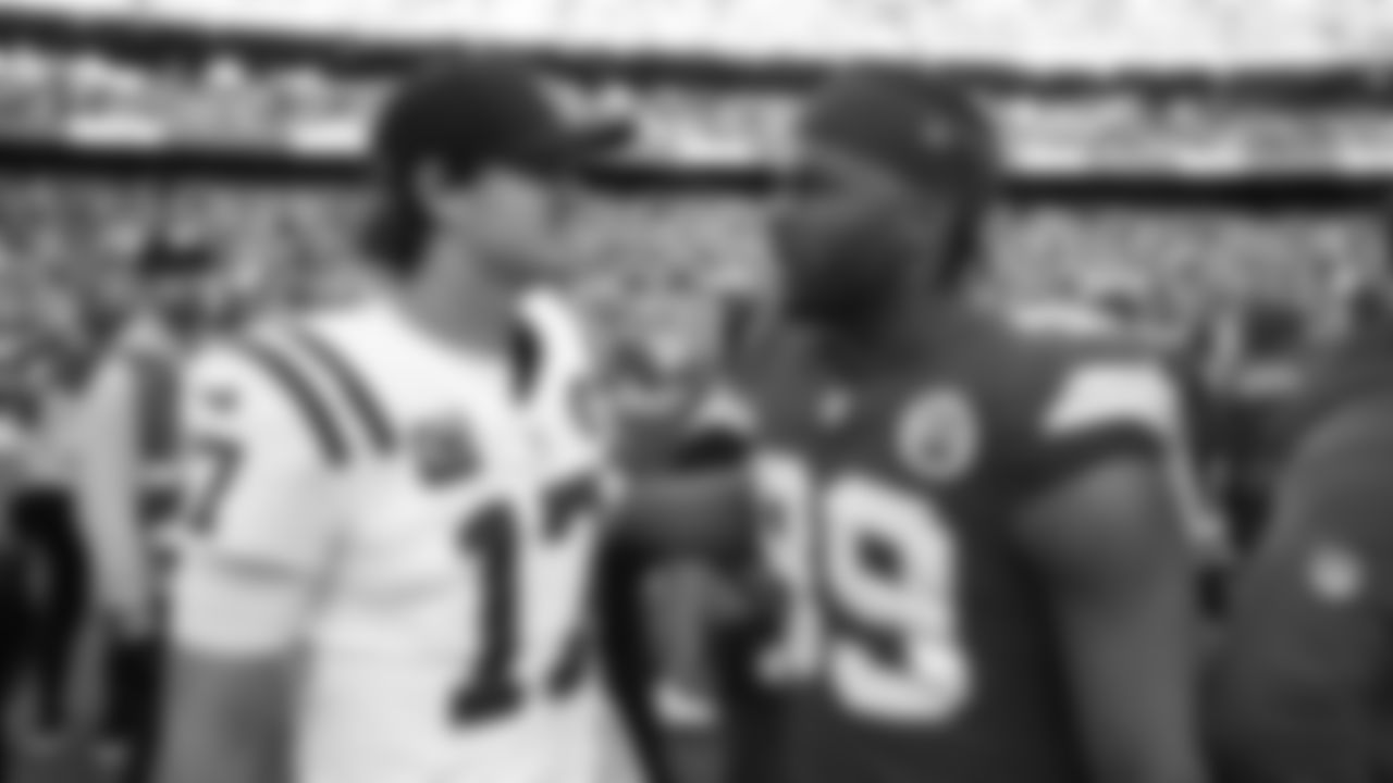 Kansas City Chiefs defensive lineman Jerry Tillery (99) talks with Indianapolis Colts talks with quarterback Daniel Jones (17) after a week 12 NFL Football game against the Indianapolis Colts on Sunday, November 23, 2025 in Kansas City, MO