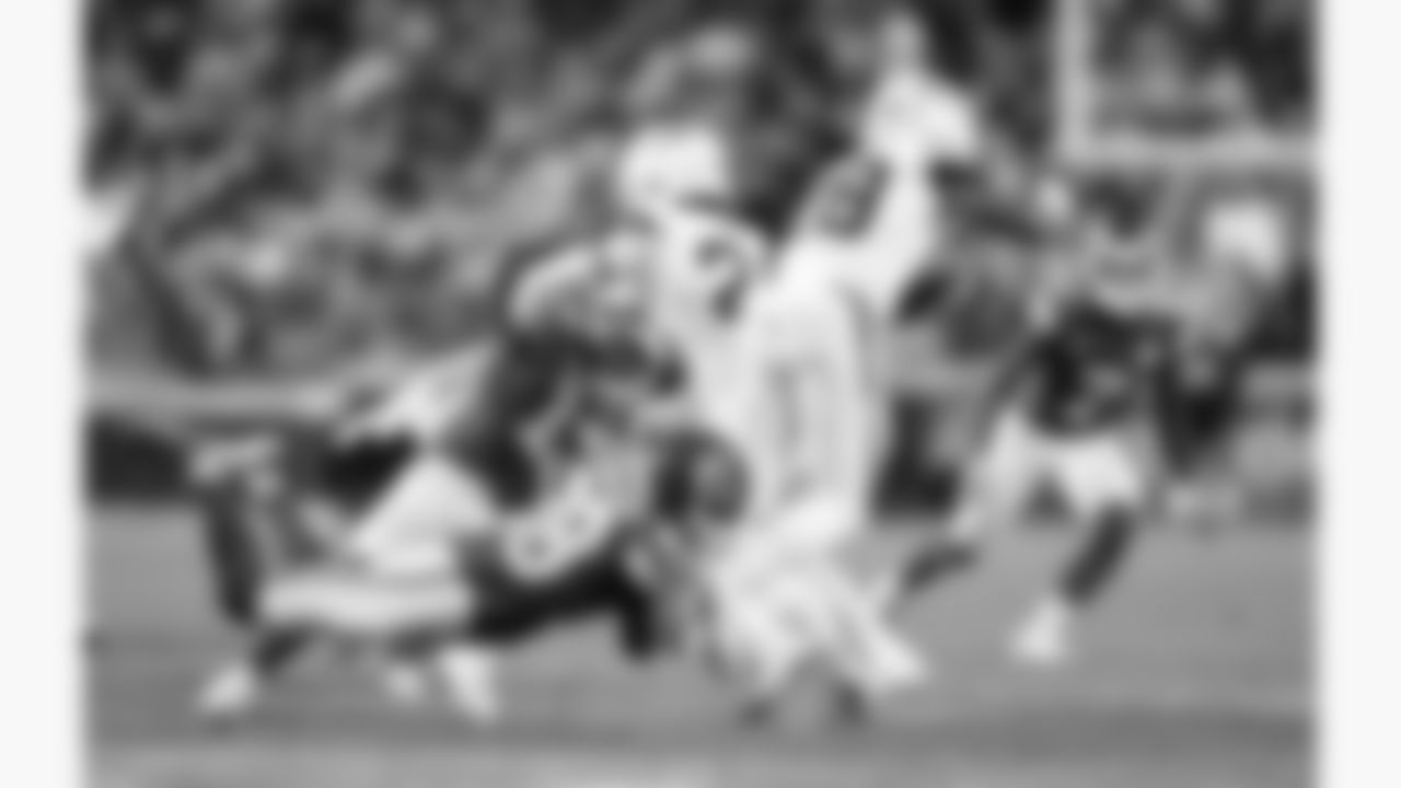 Kansas City Chiefs defensive back Kevin Knowles (38) tackles Denver Broncos running back Tyler Badie (28) during a week 17 NFL football game, Thursday, December 25, 2025 in Kansas City, MO.