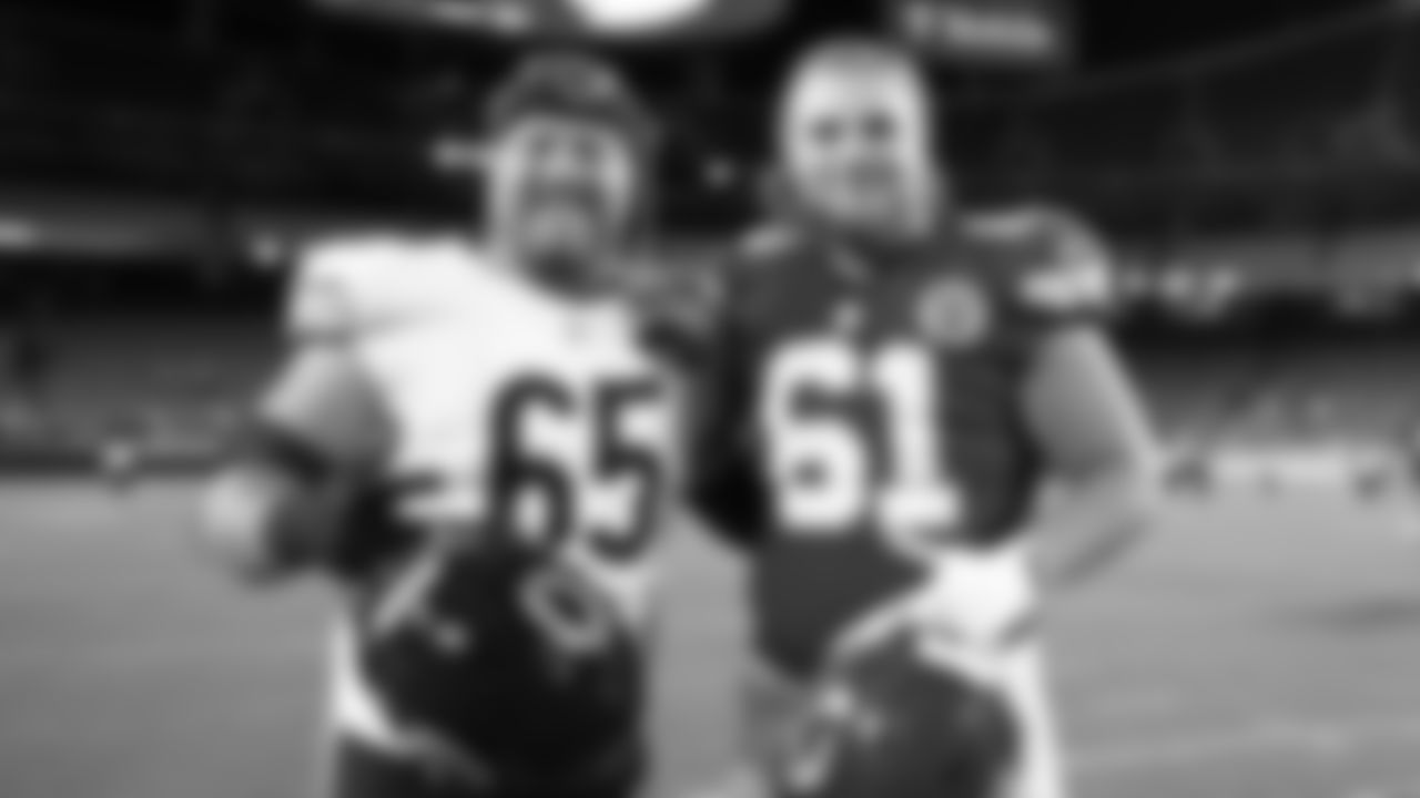 Kansas City Chiefs offensive lineman C.J. Hanson (61) and Chicago Bears offensive lineman Luke Newman (65) and after a preseason week 3 NFL football game against the Chicago Bears, Friday, August 22, 2025 in Kansas City, MO.