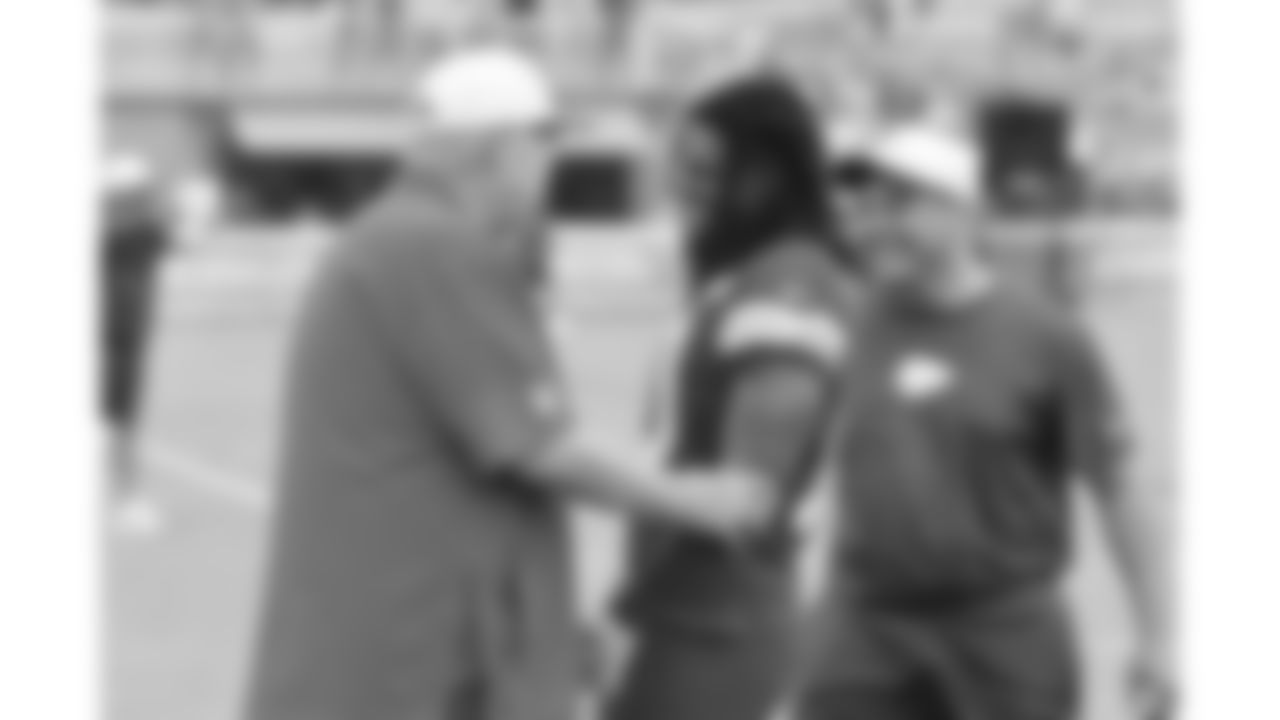 Kansas City Chiefs Head Coach Andy Reid speaks with running back Isiah Pacheco (10) during day 11 of training camp practice on Sunday, August 3, 2025.