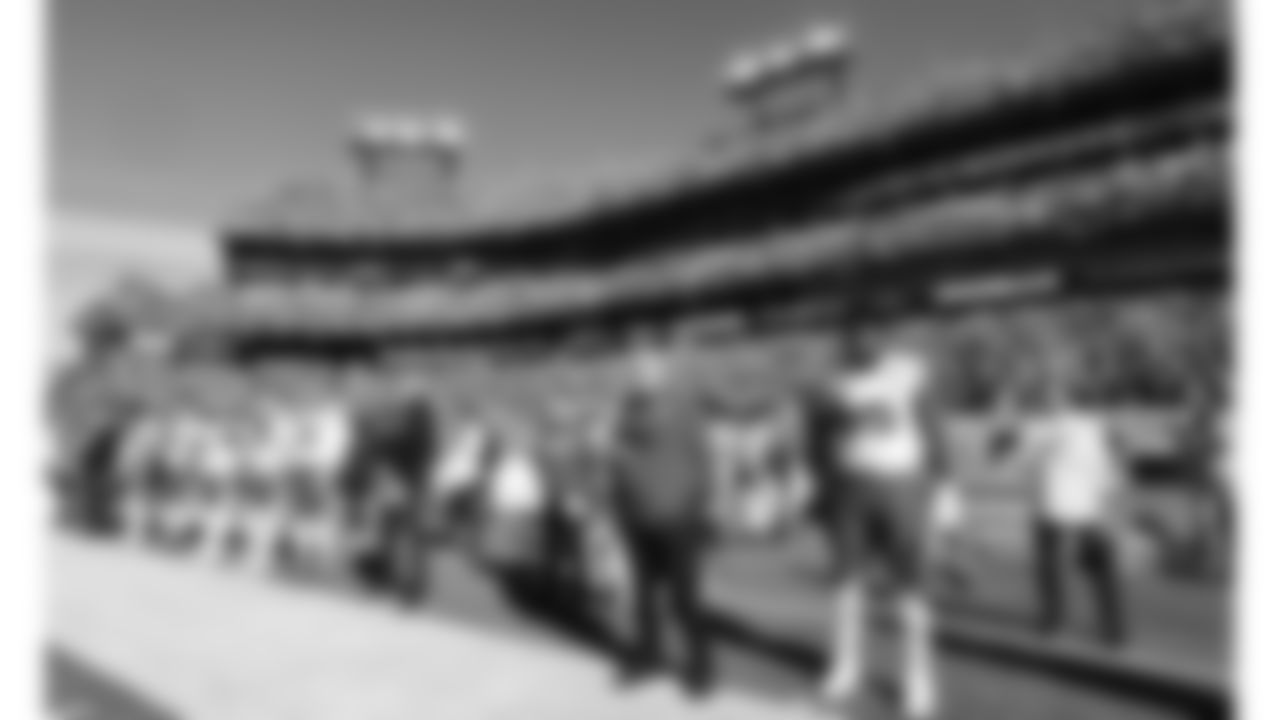 Kansas City Chiefs Head Coach Andy Reid and Kansas City Chiefs offensive lineman Trey Smith (65) during the National Anthem prior to a week 16 NFL Football game against the Tennessee Titans on Sunday, December 21, 2025 in Nashville, Tennessee.
