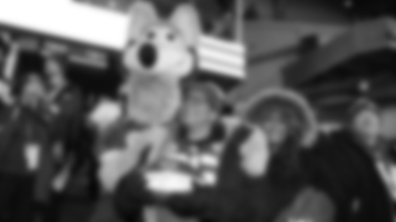 KC Wolf is with the Lamar Hunt Legacy Seat honoree Yvette Richards during an NFL week 14 matchup against the Houston Texans, Sunday December 7, 2025.