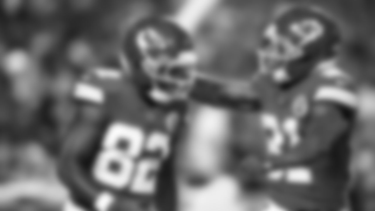 Kansas City Chiefs wide receiver Jimmy Holiday (82) Kansas City Chiefs wide receiver Nikko Remigio (81) celebrate during a preseason week 3 NFL football game against the Chicago Bears, Friday, August 22, 2025 in Kansas City, MO.