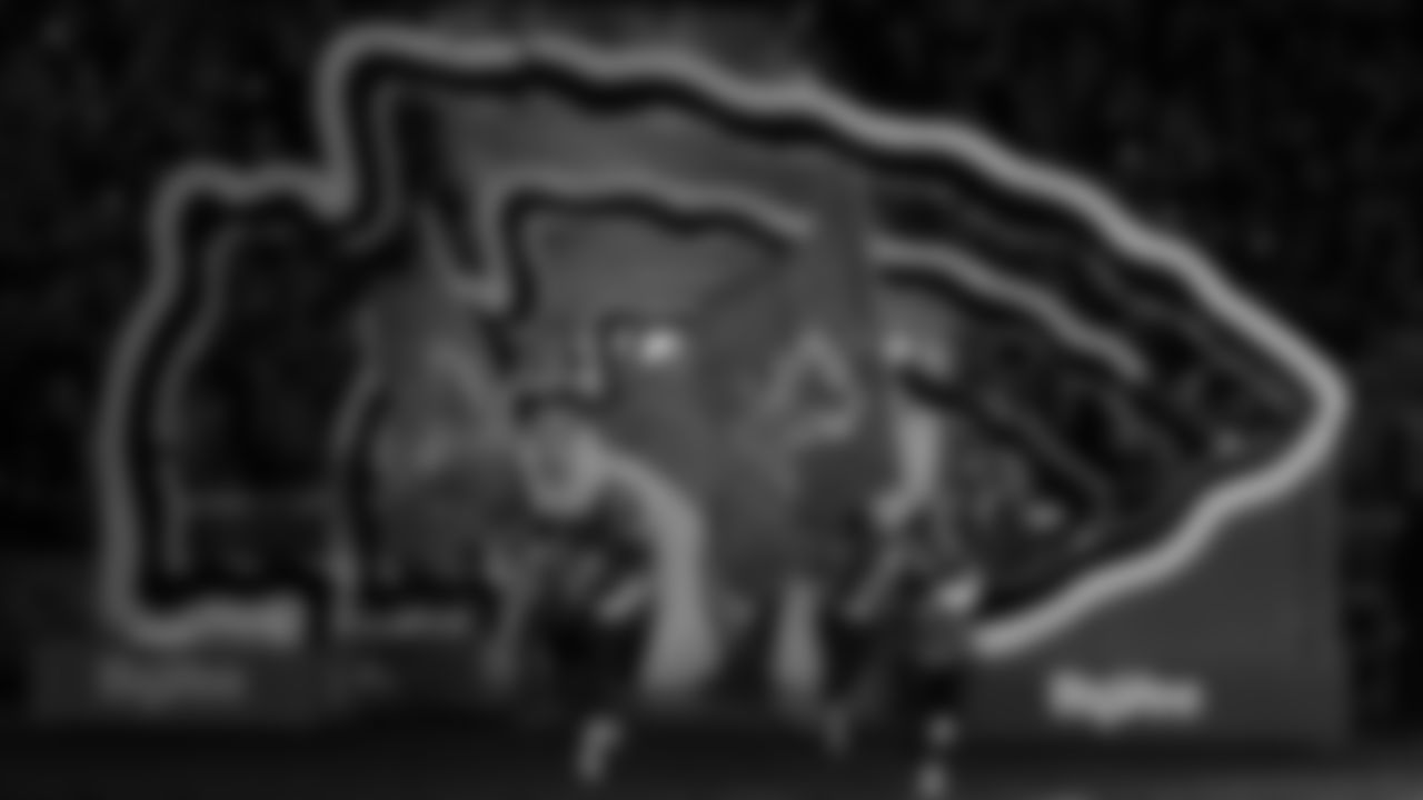 Chiefs Flag Runners enter the field prior to a week 14 NFL Football game against the Houston Texans on Sunday, December 7, 2025 in Kansas City, MO.