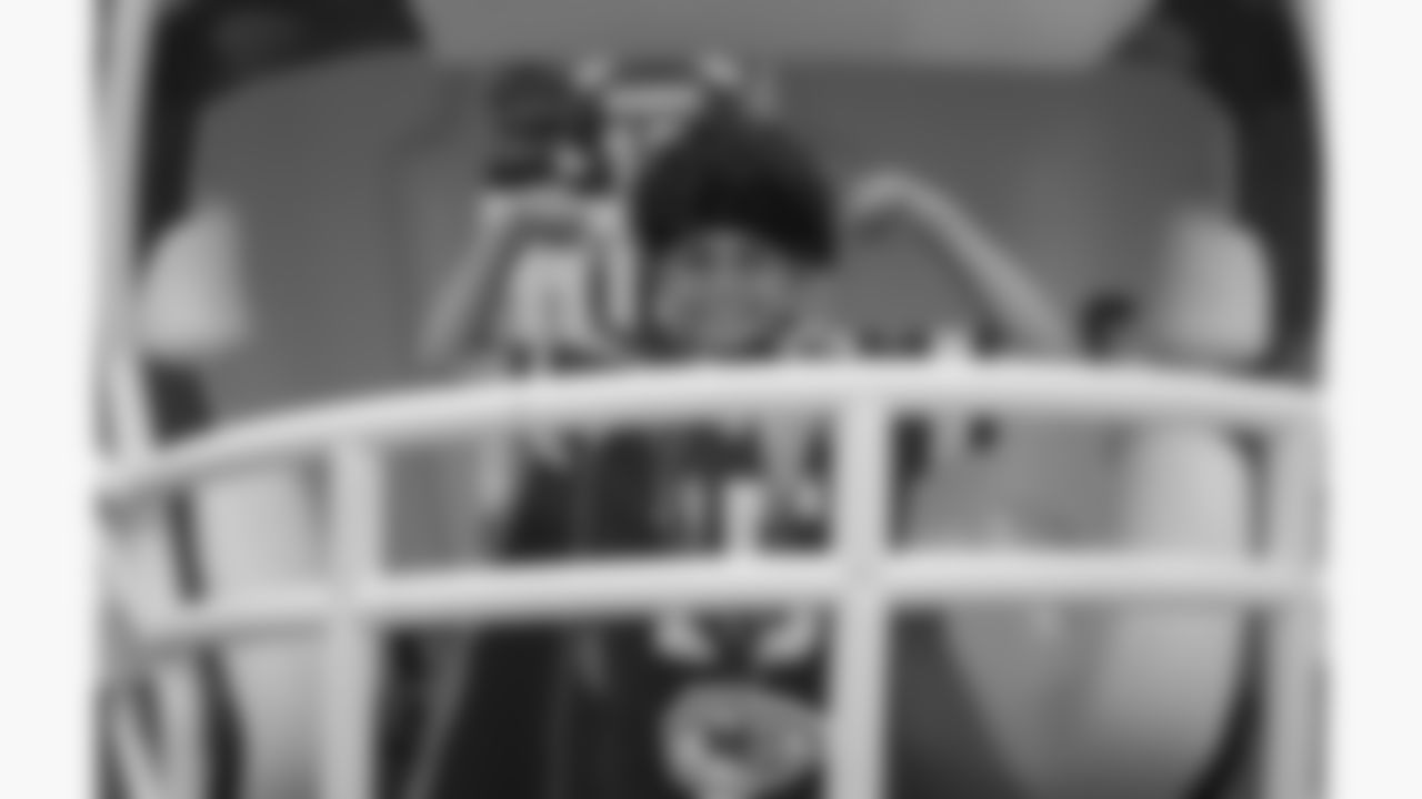 A young Kansas City Chiefs fan flexes for a photo prior to a week 2 NFL football game against the Philadelphia Eagles, Sunday, September 14, 2025 in Kansas City, MO.